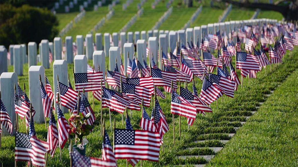 memorial gravesite with american flags